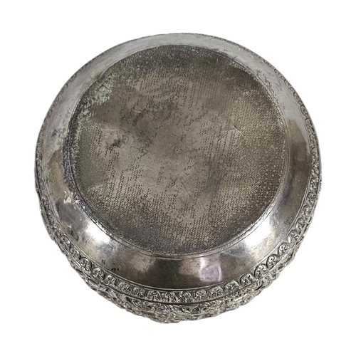 21 - A LARGE LATE 19TH CENTURY BURMESE SILVER REPOUSSÉ BOWL
Substantial deep circular form bowl, masterfu... 