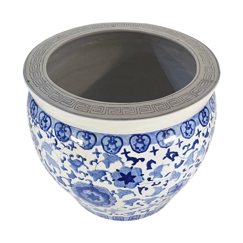 226 - A LARGE 20TH CENTURY CHINESE BLUE AND WHITE PORCELAIN FISH BOWL
Decorated in cobalt blue with scroll... 