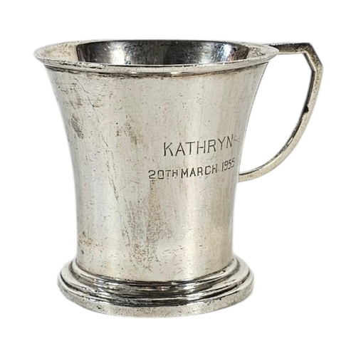 24 - A MID CENTURY CONTINENTAL SILVER CHRISTENING MUG
Single Art Deco handle and engraved inscription dat... 
