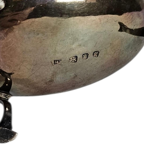 4 - A GEORGIAN SILVER SAUCE BOAT
Serrated edge with single handle, on tripod legs, hallmarked 1782.
(app... 