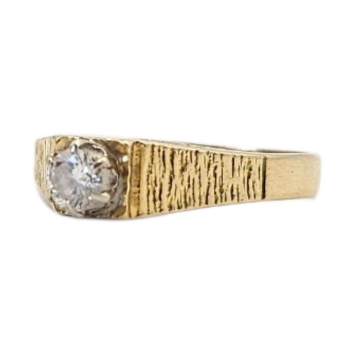 48 - A VINTAGE 18CT GOLD AND DIAMOND SOLITAIRE RING
Single round cut stone with bark design to shoulders.... 