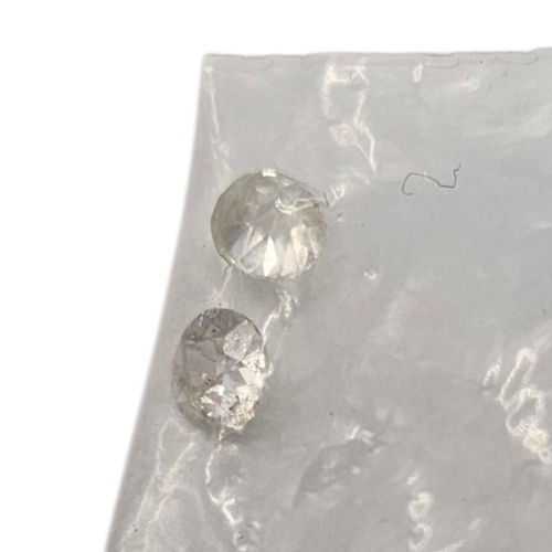 76 - A NEAR PAIR OF 1/4CT LOOSE DIAMONDS
Round brilliant cut, together with a pair of .10ct diamonds and ... 