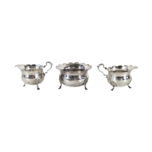 87 - A VICTORIAN SILVER SUGAR AND CREAM SET
Matched set comprising two cream jugs and a sugar bowl with s... 