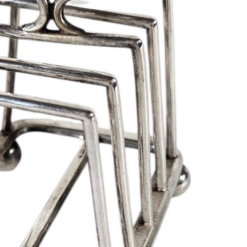 90 - AN EARLY VICTORIAN SILVER SQUARE TOASTRACK
On ball foot, hallmarked Sheffield, 1897.
(approx 8cm, ap... 
