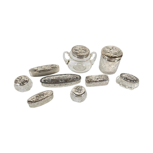 97 - A COLLECTION OF EARLY 20TH CENTURY SILVER ‘REYNOLDS ANGELS’ AND CUT GLASS TRINKET BOXES
Each having ... 
