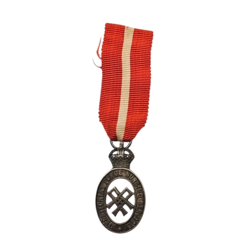 116A - AN EARLY 20TH CENTURY INDIAN WHITE METAL COMMEMORATIVE KEY
Bearing inscription ‘Gampola Kirinda Govt... 