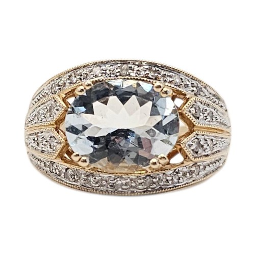 137 - A 14CT GOLD, AQUAMARINE AND DIAMOND CLUSTER RING
The central oval cut stove within four rows of diam... 