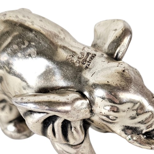 140 - A VINTAGE SILVER FILLED ELEPHANT PAPERWEIGHT
Standing pose marked ‘remeito’ 925, together with a sma... 