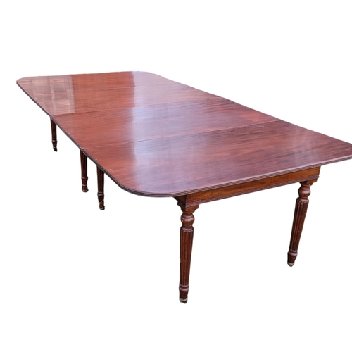9120 - A VICTORIAN MAHOGANY EXTENDING DINING TABLE
With telescopic action, the rounded rectangular top with... 