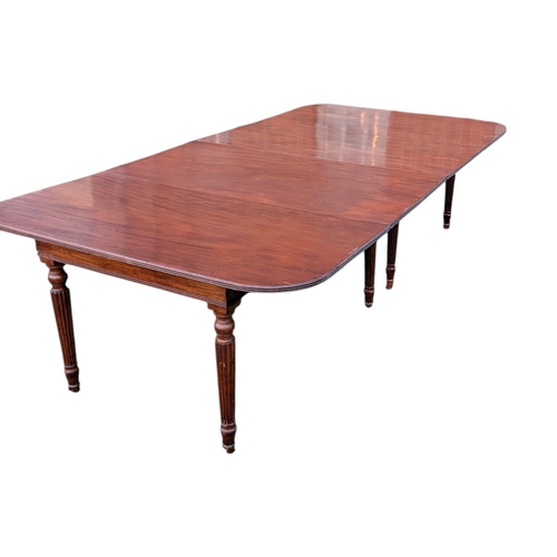 9120 - A VICTORIAN MAHOGANY EXTENDING DINING TABLE
With telescopic action, the rounded rectangular top with... 