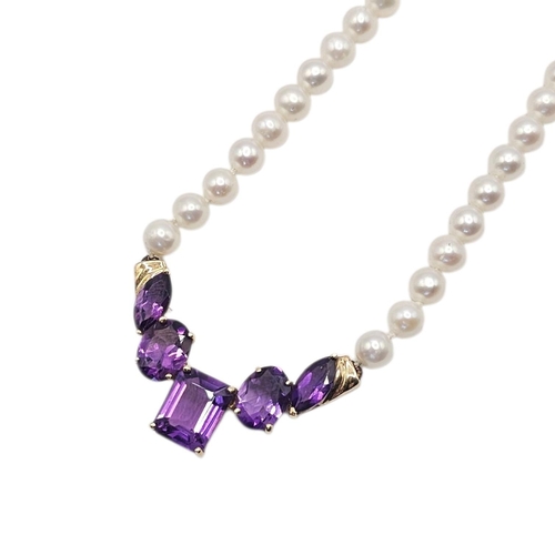 138 - A VINTAGE 10CT GOLD AND AMETHYST AND PEARL NECKLACE
Having an arrangement of oval,marquis and baguet... 
