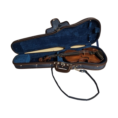 101 - A 19TH CENTURY GERMAN ¾ SIZE VIOLIN
Brown, length of back 33cm, overall 54cm, cased.

Condition: goo... 