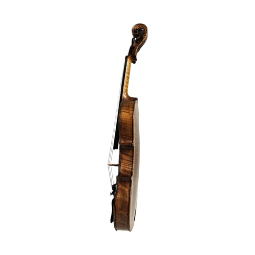 101 - A 19TH CENTURY GERMAN ¾ SIZE VIOLIN
Brown, length of back 33cm, overall 54cm, cased.

Condition: goo... 