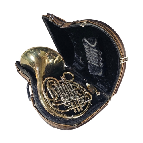 105 - A CASED VINTAGE BRASS ‘HOLTON H180’ PROFESSIONAL DOUBLE HORN
’Farkas’ large-bore Kruspe wrap design ... 