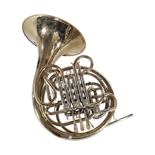 105 - A CASED VINTAGE BRASS ‘HOLTON H180’ PROFESSIONAL DOUBLE HORN
’Farkas’ large-bore Kruspe wrap design ... 