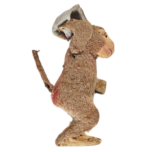 115 - AN EARLY 20TH CENTURY ‘CLOCKWORK’ MONKEY TOY
Key wind mechanism, together with a miniature jointed s... 