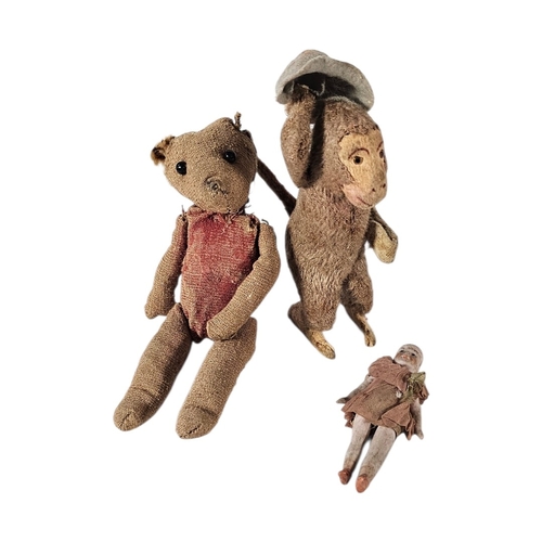 115 - AN EARLY 20TH CENTURY ‘CLOCKWORK’ MONKEY TOY
Key wind mechanism, together with a miniature jointed s... 