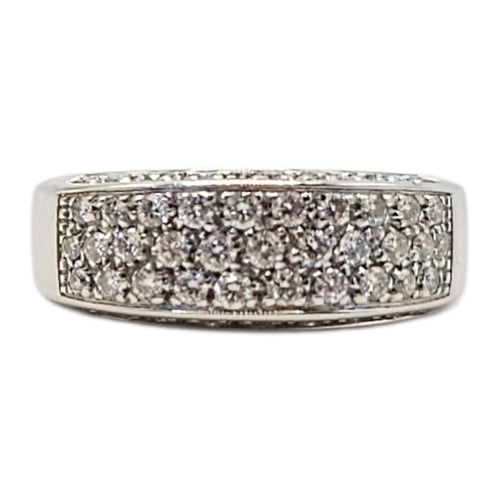 129 - AN 18CT WHITE GOLD AND DIAMOND THREE ROW RING
Three rows of round cut diamonds with diamonds set to ... 