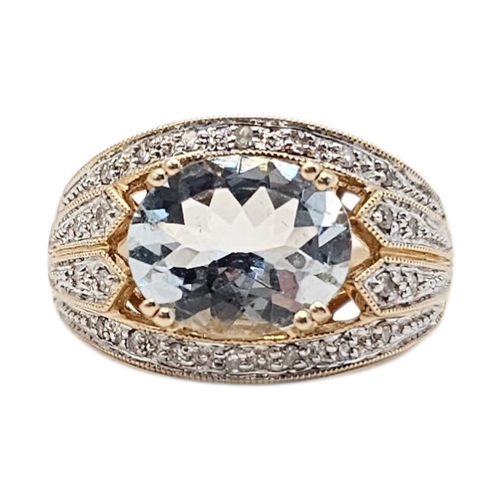 137 - A 14CT GOLD, AQUAMARINE AND DIAMOND CLUSTER RING
The central oval cut stove within four rows of diam... 
