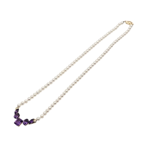 138 - A VINTAGE 10CT GOLD AND AMETHYST AND PEARL NECKLACE
Having an arrangement of oval,marquis and baguet... 