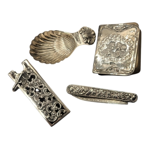 147 - A VICTORIAN SILVER COMB CASE
Rectangular form, with pierced decoration and hanging bale, hallmarked ... 