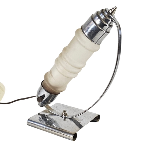 164 - AN ART DECO GLASS AND CHROME ‘MACHINE AGE ROCKET’ DESK LAMP
Semi elliptical mount with frosted glass... 