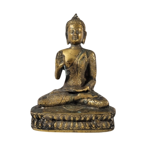 200 - AN EARLY 20TH CENTURY TIBETAN BRONZE FIGURE OF GUATAMA BUDDHA 
Depicted seated in dhyanasana (medita... 