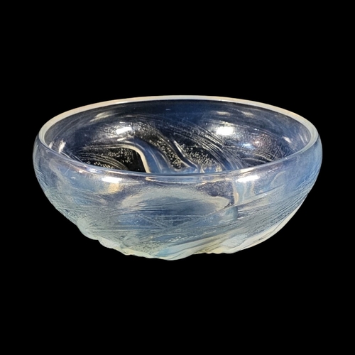 212 - R. LALIQUE, AN ART DECO OPELESCENT ‘ONDINES' FIGURAL GLASS BOWL
In the pattern (No. 380), featuring ... 