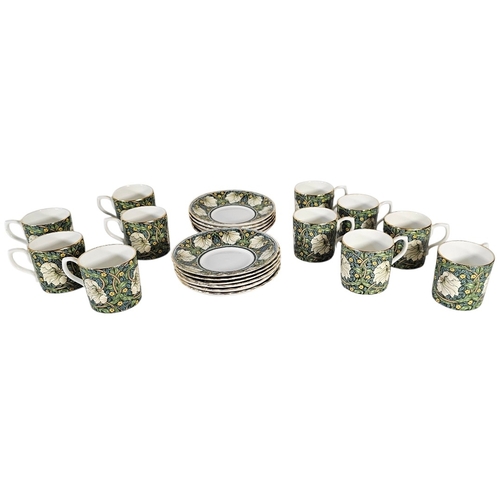 222 - A SET OF TEN WILLIAM MORRIS 'PIMPERNEL' DESIGN PORCELAIN COFFEE CANS
A fine set of eleven bone china... 