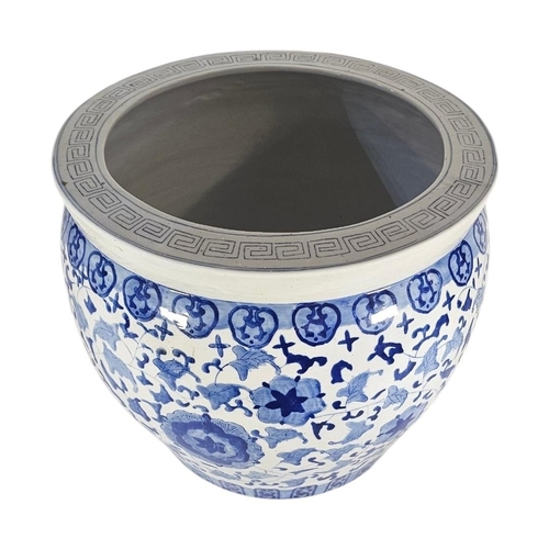 226 - A LARGE 20TH CENTURY CHINESE BLUE AND WHITE PORCELAIN FISH BOWL
Decorated in cobalt blue with scroll... 