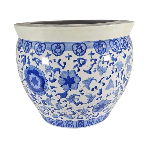 226 - A LARGE 20TH CENTURY CHINESE BLUE AND WHITE PORCELAIN FISH BOWL
Decorated in cobalt blue with scroll... 