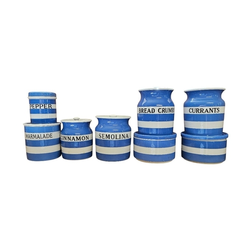 232 - T.G. GREEN, A COLLECTION OF EARLY 20TH CENTURY CORNISHWARE POTTERY STORAGE JARS
Blue and white bande... 