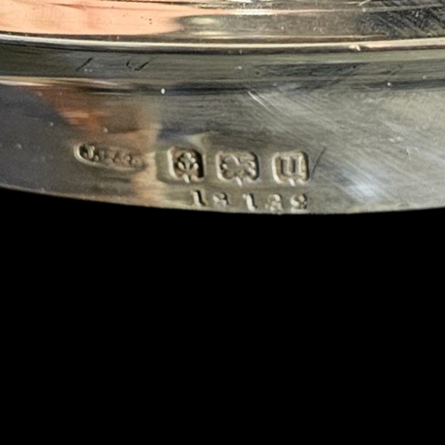 33 - A LARGE EDWARDIAN SILVER AND CUT GLASS BISCUIT BOX
Circular form with engine turned decoration and c... 