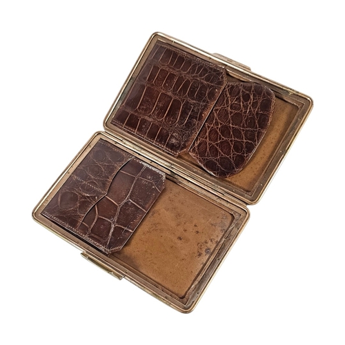3A - A VICTORIAN 9CT GOLD AND CROCODILE SKIN WALLET
Rectangular form with 9ct gold set to corners and fit... 