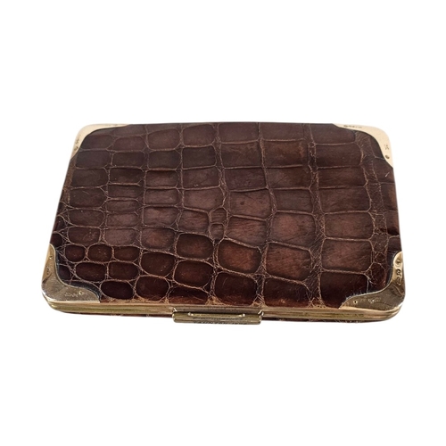 3A - A VICTORIAN 9CT GOLD AND CROCODILE SKIN WALLET
Rectangular form with 9ct gold set to corners and fit... 