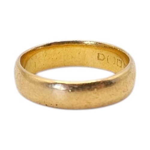47 - AN EARLY 20TH CENTURY YELLOW METAL WEDDING RING
Wide band of plain form.
(tests as high carat gold, ... 