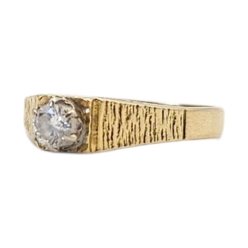 48 - A VINTAGE 18CT GOLD AND DIAMOND SOLITAIRE RING
Single round cut stone with bark design to shoulders.... 