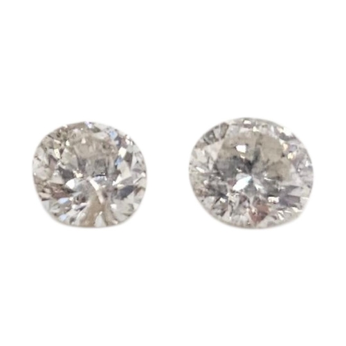 75 - A NEAR PAIR OF 3/4CT ROUND BRILLIANT CUT LOOSE DIAMONDS.


Condition: good overall, no damage or rep... 