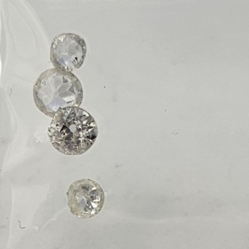 76 - A NEAR PAIR OF 1/4CT LOOSE DIAMONDS
Round brilliant cut, together with a pair of .10ct diamonds and ... 