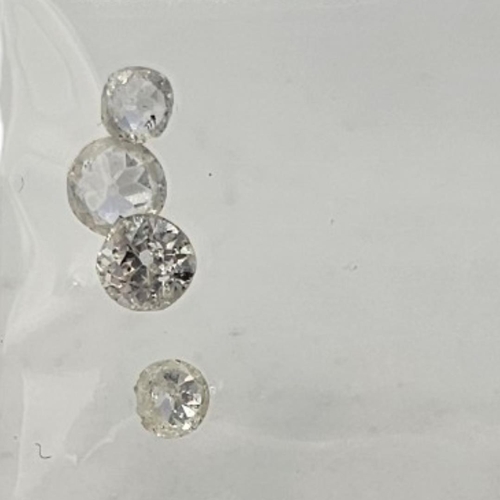 76 - A NEAR PAIR OF 1/4CT LOOSE DIAMONDS
Round brilliant cut, together with a pair of .10ct diamonds and ... 