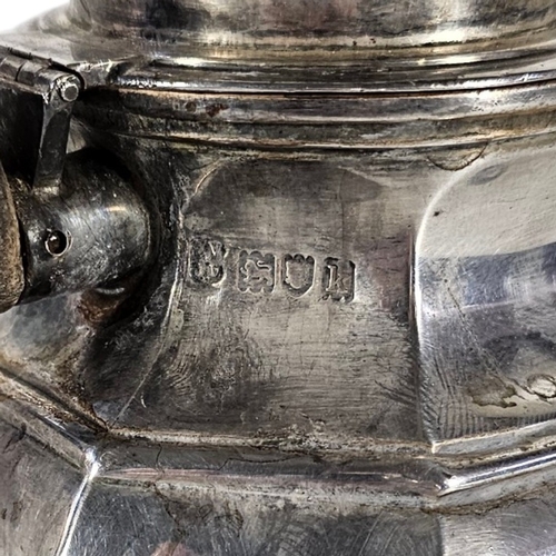 79 - AN EARLY 20TH CENTURY SILVER TEAPOT
Octagonal form, with turned wooden handle, hallmarked London, 19... 