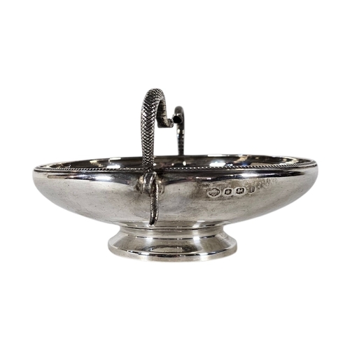 81 - AN EARLY ART DECO SILVER ‘SNAKE’ BOWL
Two serpent form handled with classical border, hallmarked Wil... 