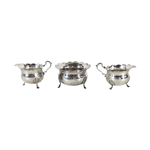 87 - A VICTORIAN SILVER SUGAR AND CREAM SET
Matched set comprising two cream jugs and a sugar bowl with s... 