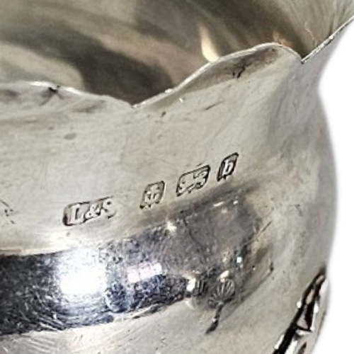 87 - A VICTORIAN SILVER SUGAR AND CREAM SET
Matched set comprising two cream jugs and a sugar bowl with s... 