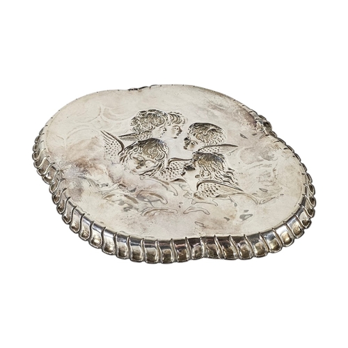 93 - AN EARLY 20TH CENTURY ‘REYNOLDS ANGELS’ SILVER OVAL TRINKET TRAY
With scalloped edge and embossed an... 