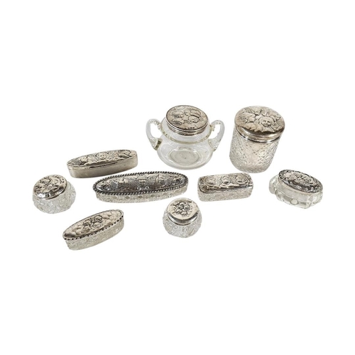 97 - A COLLECTION OF EARLY 20TH CENTURY SILVER ‘REYNOLDS ANGELS’ AND CUT GLASS TRINKET BOXES
Each having ... 