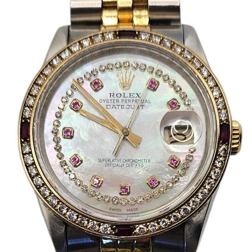 10A - ROLEX, DATEJUST, AN 18CT GOLD, STAINLESS STEEL, DIAMOND AND RUBY GENT’S WRISTWATCH
Having baguette c... 