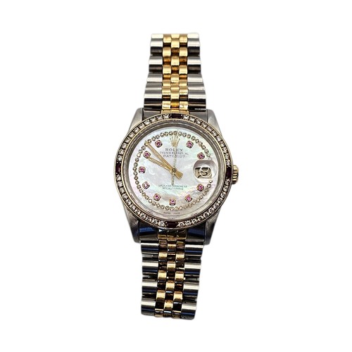 10A - ROLEX, DATEJUST, AN 18CT GOLD, STAINLESS STEEL, DIAMOND AND RUBY GENT’S WRISTWATCH
Having baguette c... 