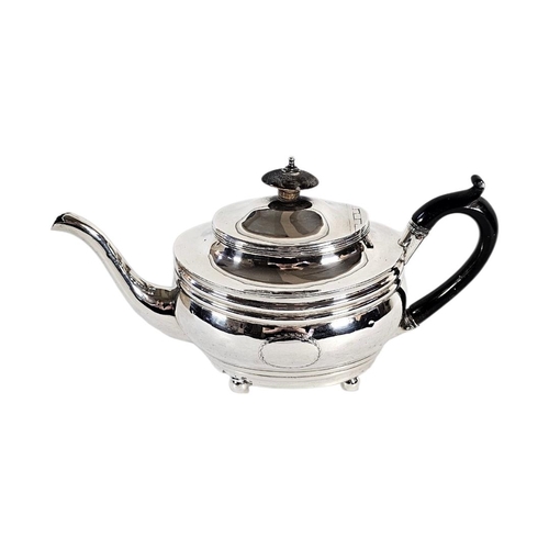 1 - A GEORGIAN SILVER OVAL TEAPOT
With engraved cartouche, having ebonised finial and handle, hallmarked... 