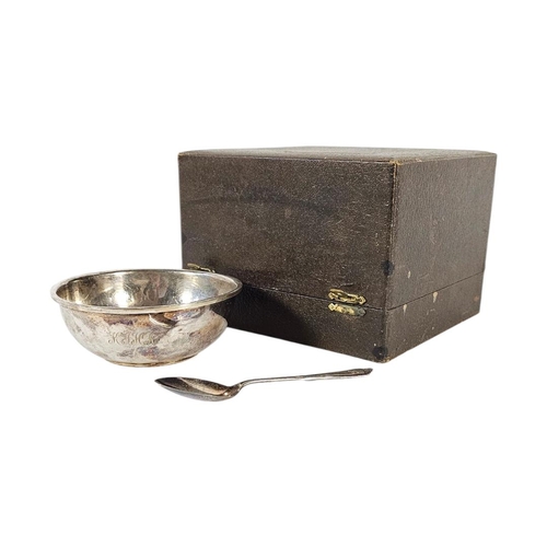 16 - AN EARLY 20TH CENTURY SILVER CHRISTENING BOWL AND SPOON
Plain form, hallmarked Birmingham, 1953, in ... 